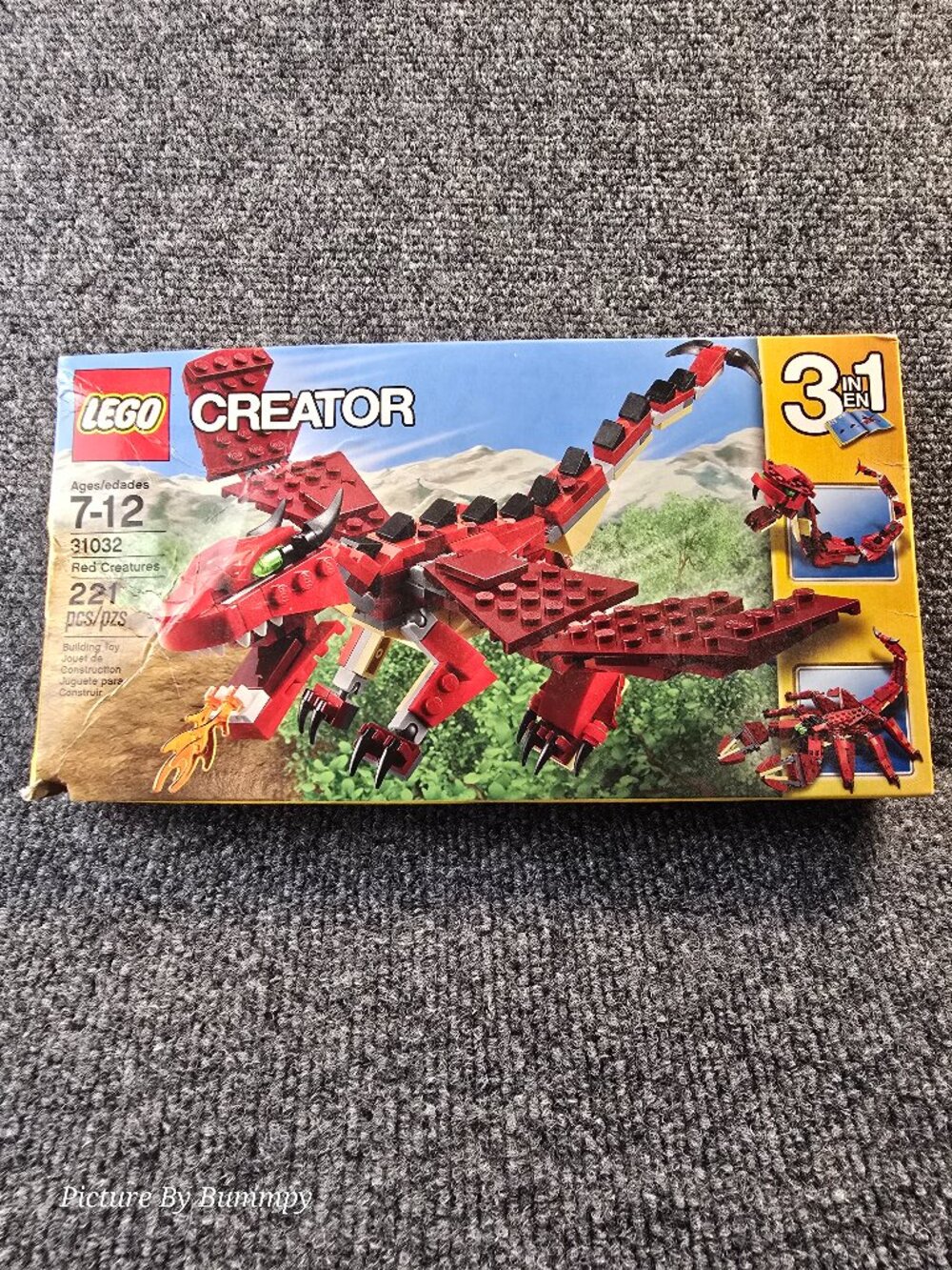 LEGO Creator 31032 Red Creatures set, which includes 221 pieces.